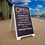 budget_a-board_at_the_seafront_showing_pub_artwork