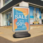 sentinel_outside_clothes_store_showing_sale_artwork_2-Copy