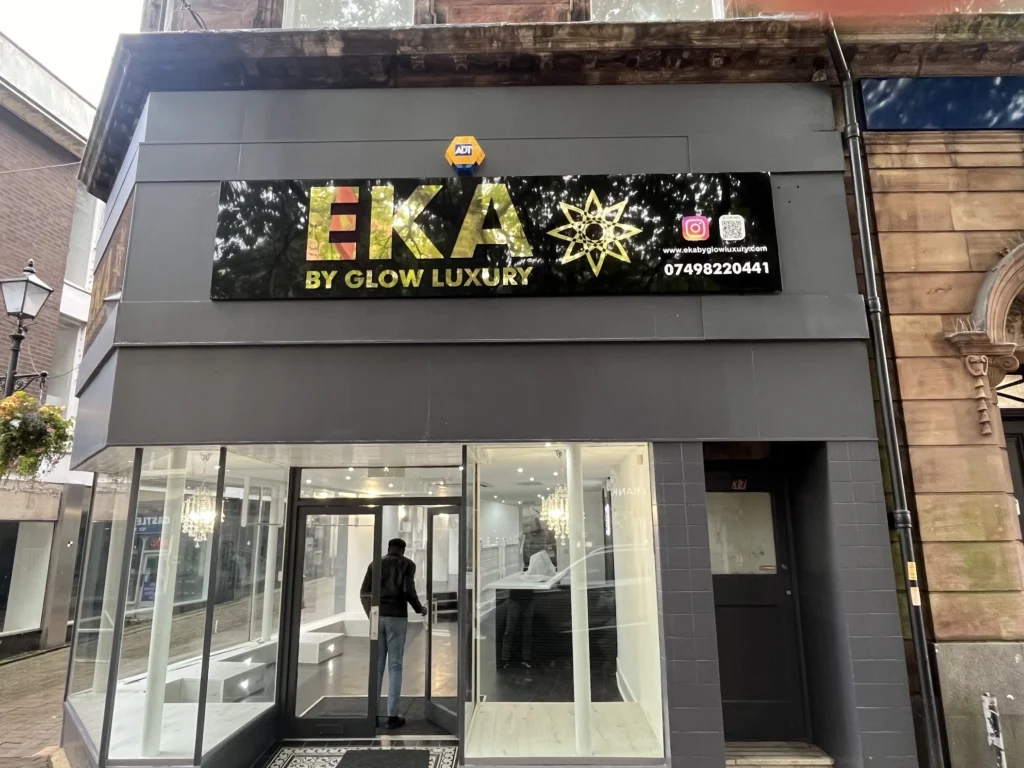 Illuminated shop fascia sign for EKA by Glow Luxury, made by PrintingX