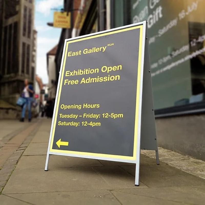 informer_outside_art_gallery_showing_exhibition_opening_times